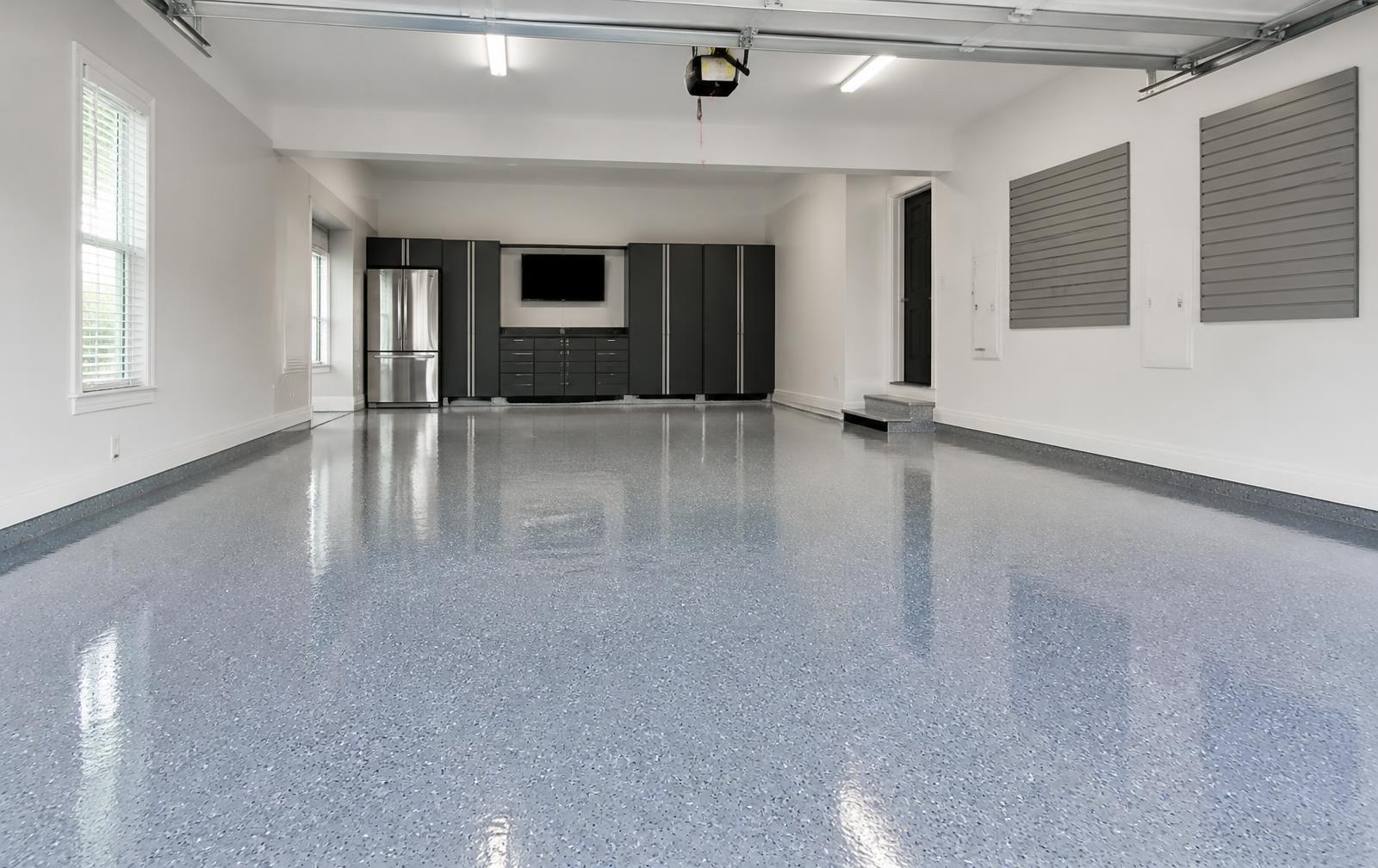 Garage with a finished gray flake epoxy floor coating